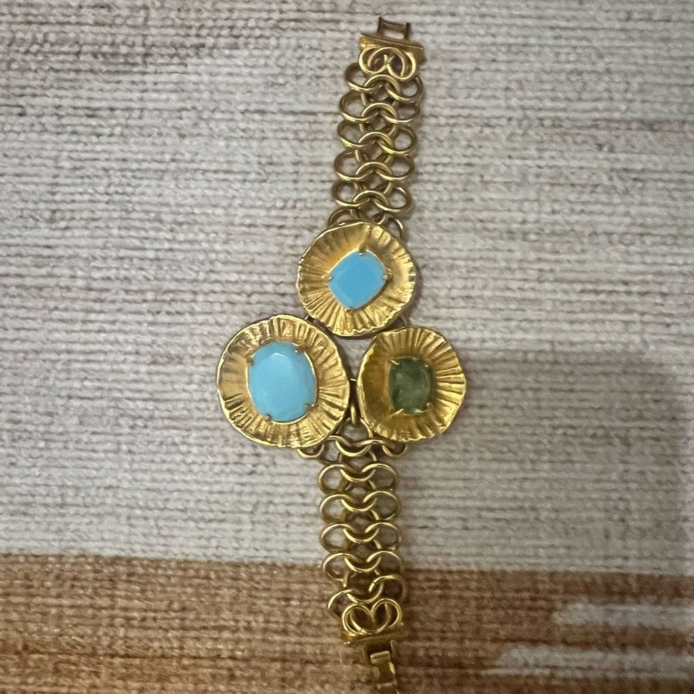 Elegant Gold Bracelet with Blue Accents